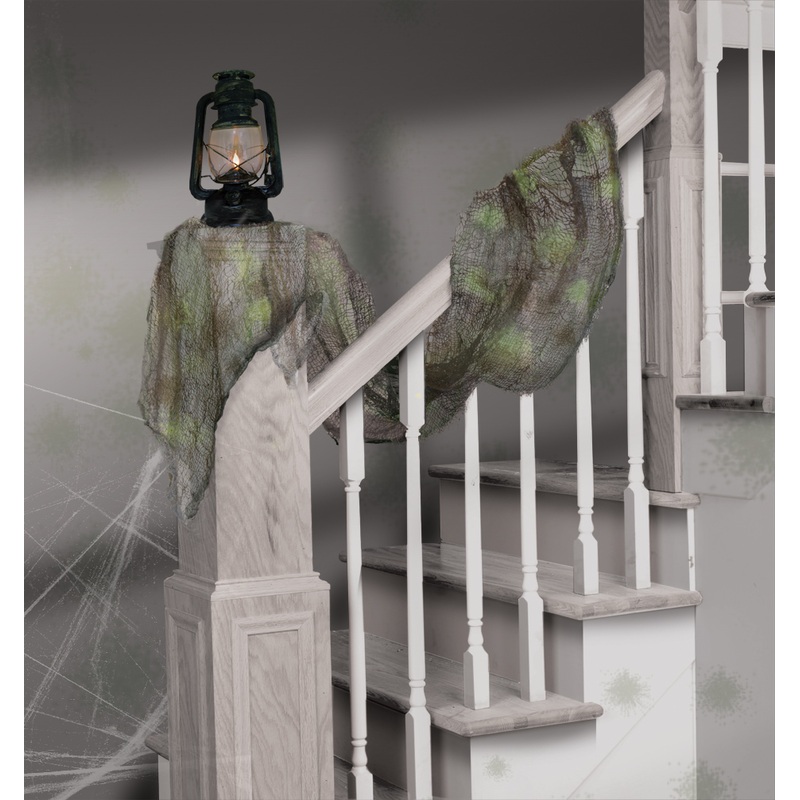 Yellowed gray-green Halloween decoration fabric