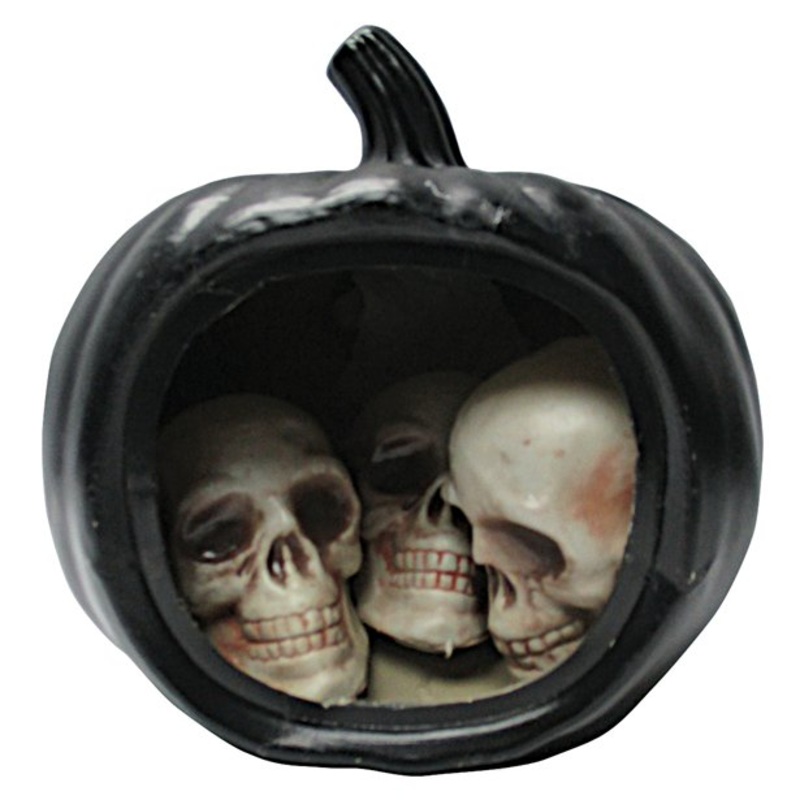 Skulls in a pumpkin decoration figure with light
