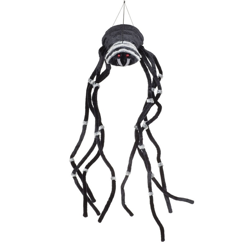 Hanging giant spider with luminous eyes