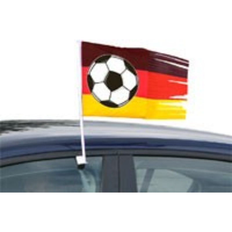 Torn car flag Germany with soccer ball