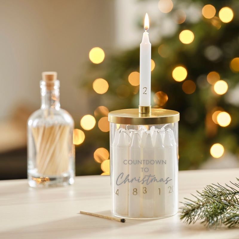 Advent calendar 24 candles in a glass