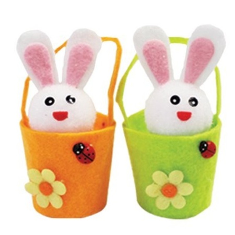 2 decorative bunnies in a felt basket
