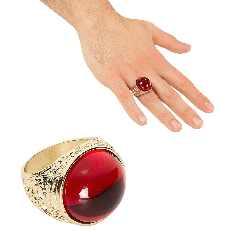 Golden ring with red stone