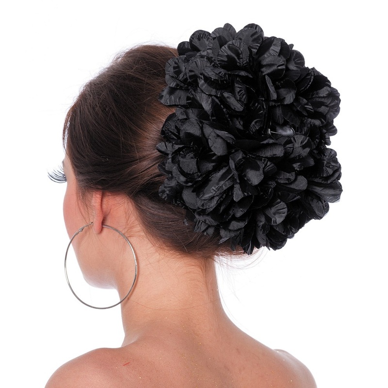 Black tufts of bobby pins